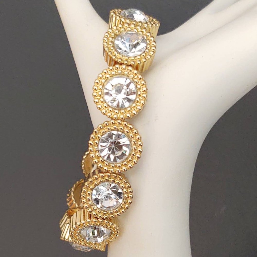 Textured gold stretch bracelet with clear beads